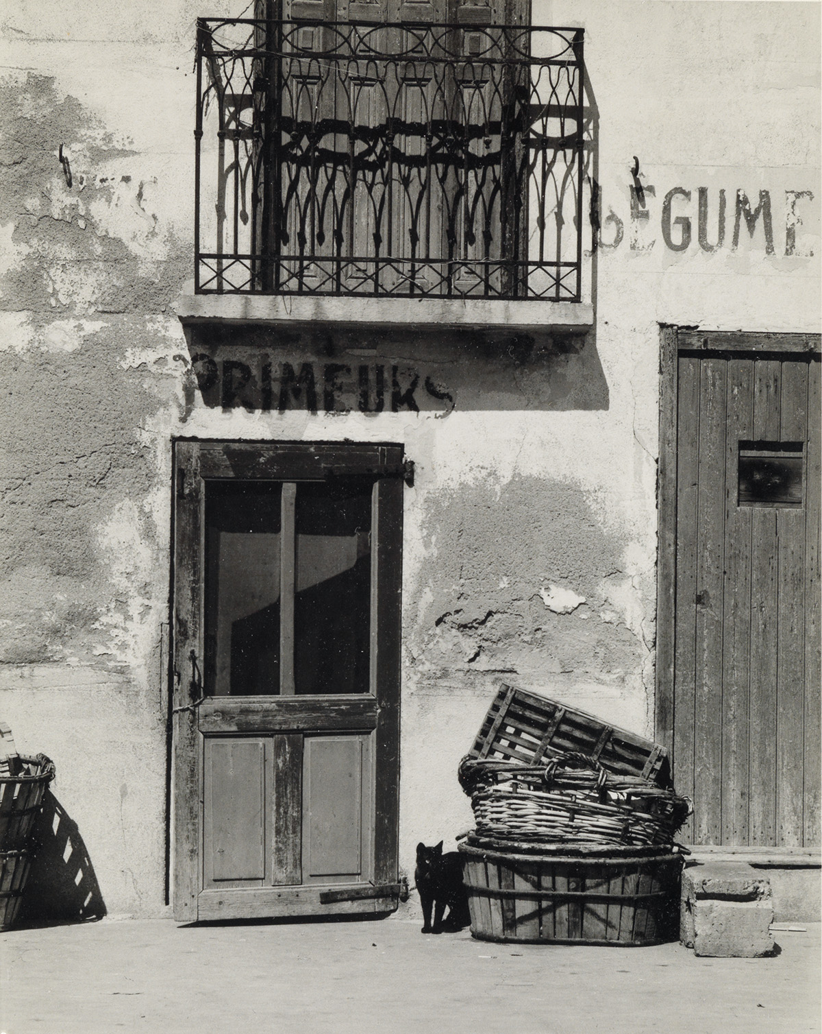 PAUL STRAND (1890-1976) Shop, Le Bacares, Pyrénées, Orientales, France (with black cat).